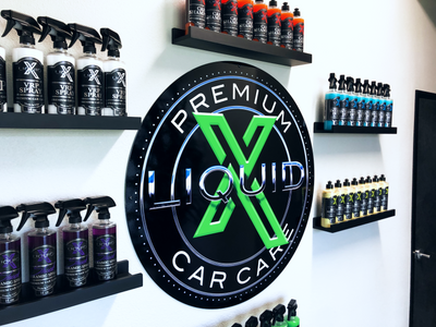 Liquid X Metal Wall Hanging Sign